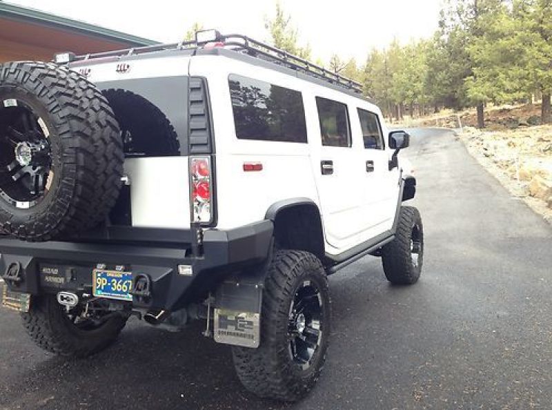 Road Armor 03-09 Hummer H2 Dakar Rear Non-Winch Bumper w/Tire Carrier - Tex Blk