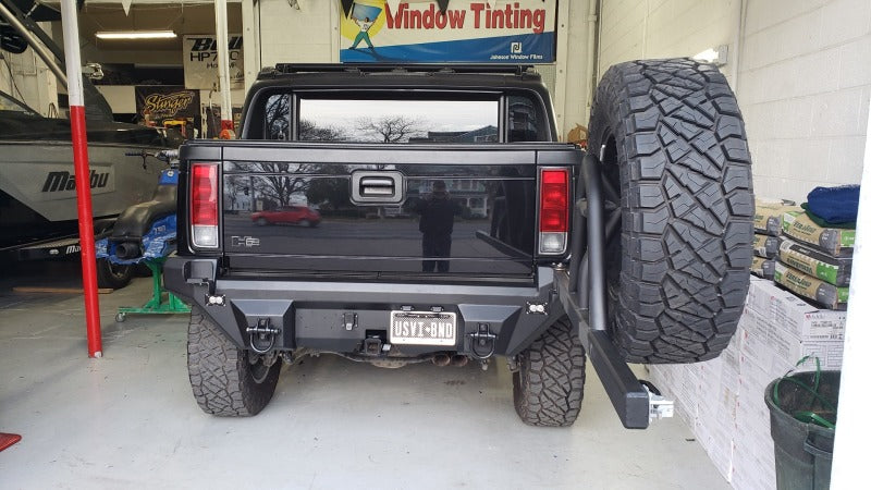 Road Armor 03-09 Hummer H2 Dakar Rear Non-Winch Bumper w/Tire Carrier - Raw