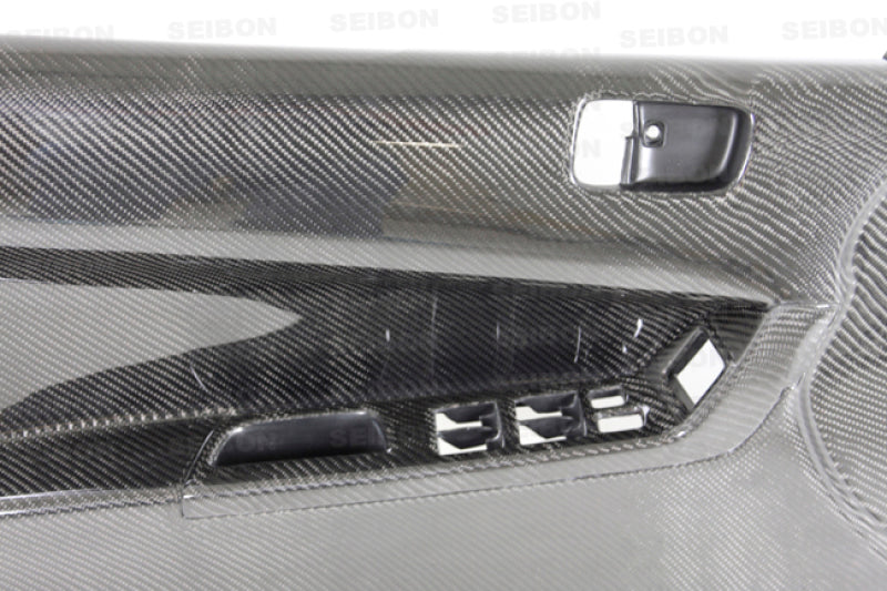 Seibon 08-12 Mitsubishi Evo Carbon Fiber Front Door Panels